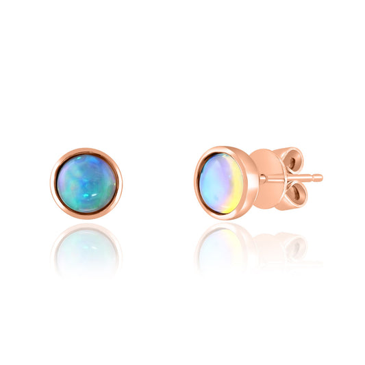 Opal stud earrings in rose gold.
