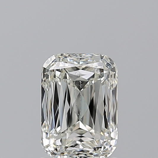 Emerald-cut diamond with radiant facets.