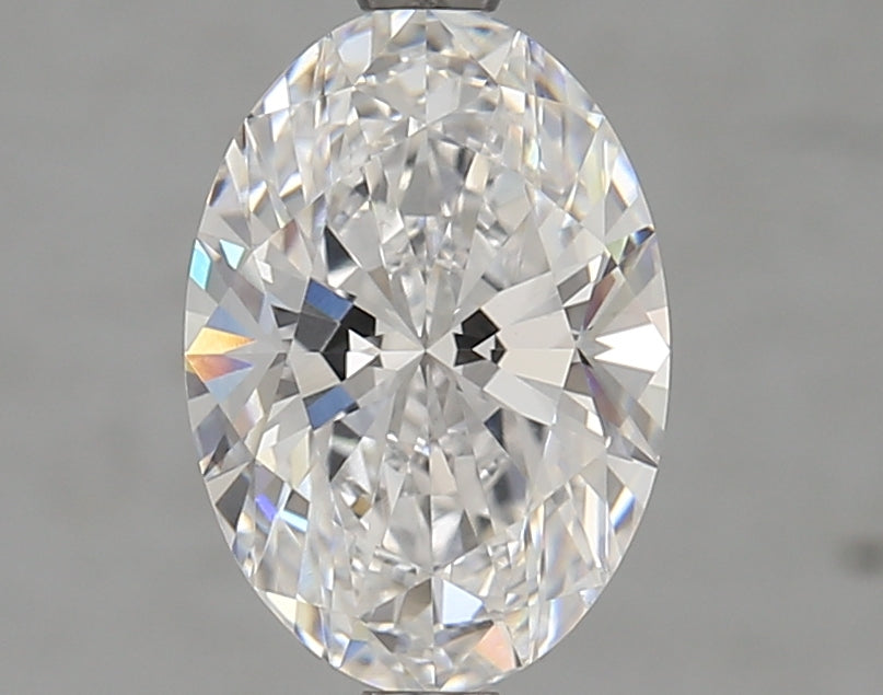 Oval-cut lab diamond with brilliant facets.