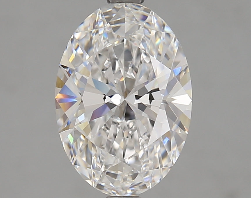 Oval lab-grown diamond, brilliant facets, clear sparkle.