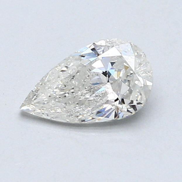 Pear-shaped natural diamond, 0.72 carat, brilliant facets.