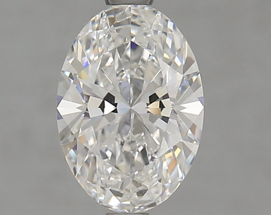 Oval-shaped lab diamond with brilliant facets.