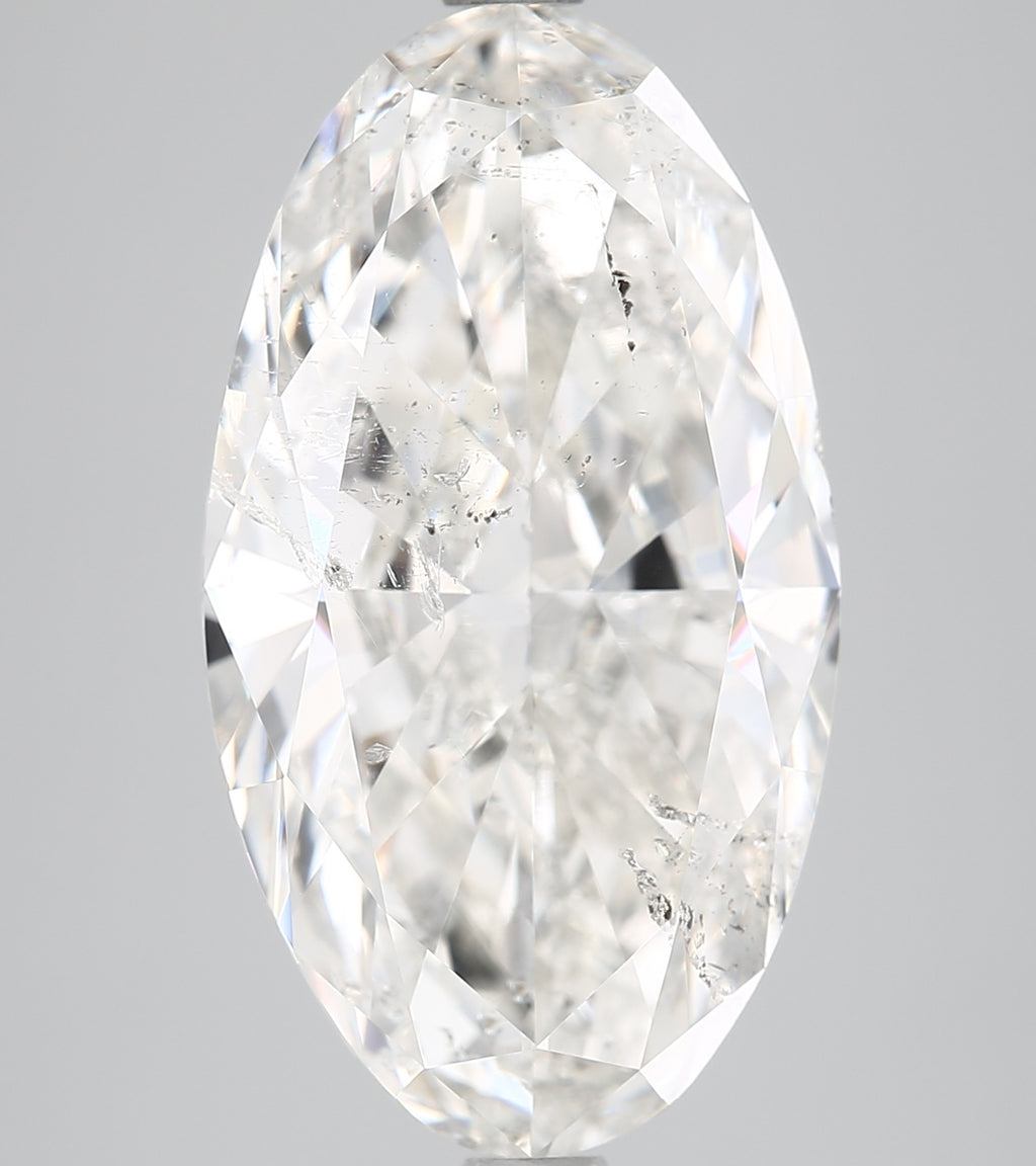 Oval-cut natural diamond, 5.04 carats, clear facets.
