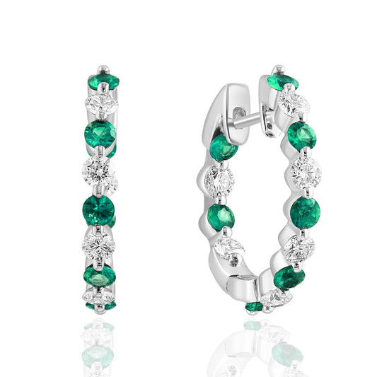Emerald and diamond hoop earrings in white gold.