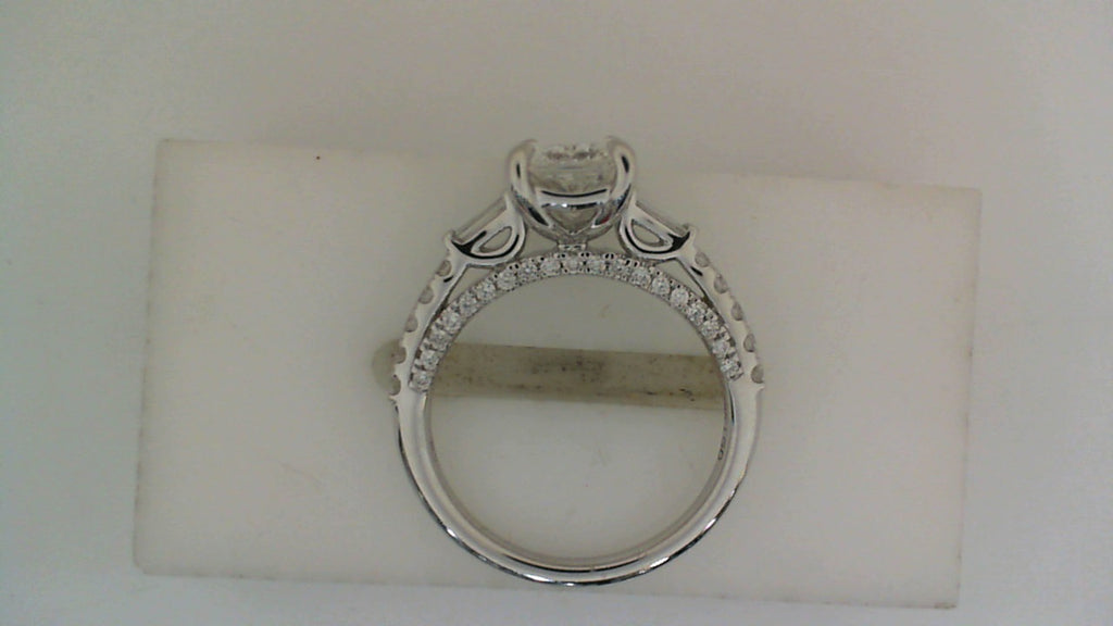 18K white gold ring with side diamonds.