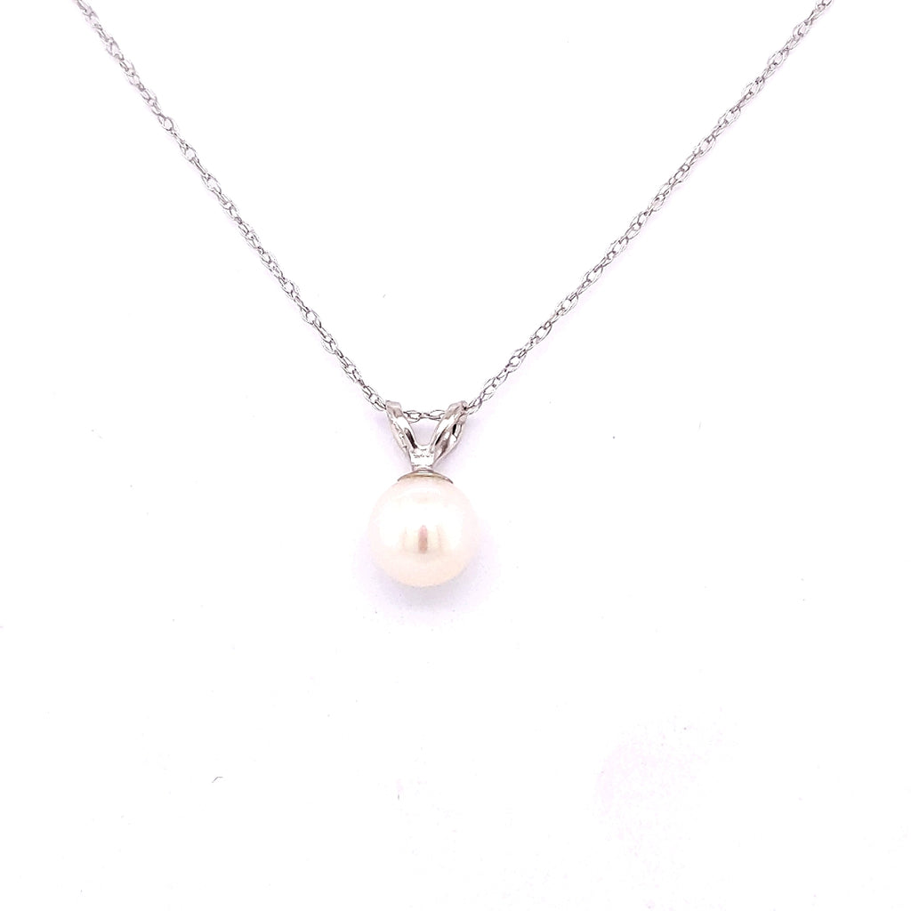 14K white gold necklace with pearl pendant.