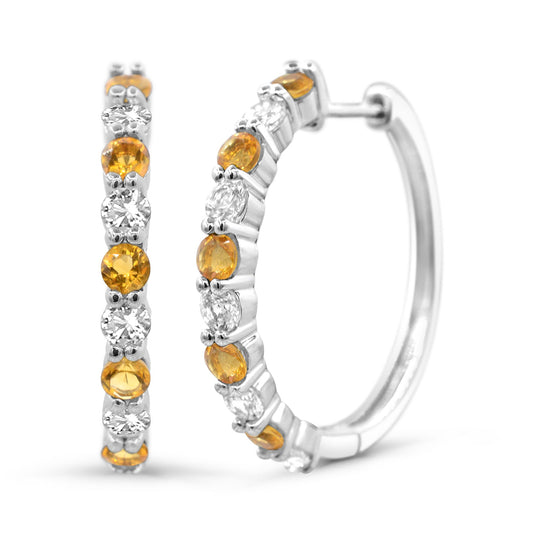 Sterling silver hoops with citrines and sapphires.