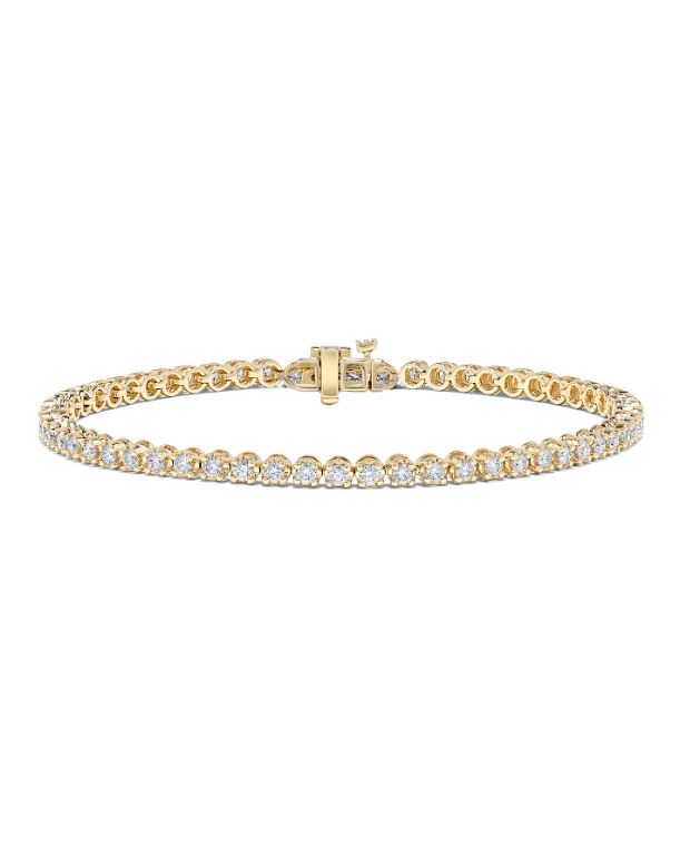 14K yellow gold diamond tennis bracelet.