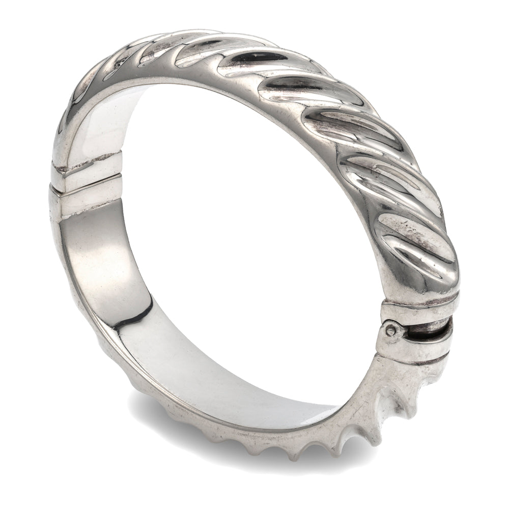 Sterling silver bangle with textured design.