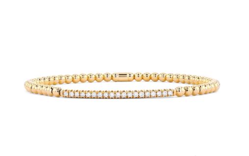 18K yellow gold bracelet with round diamonds.