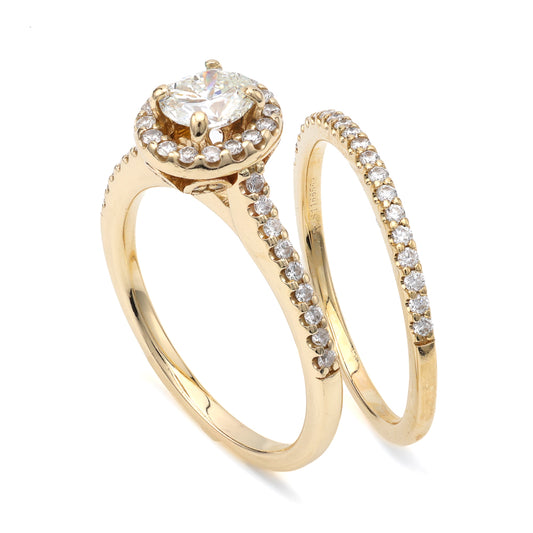 Halo diamond engagement ring, yellow gold band.