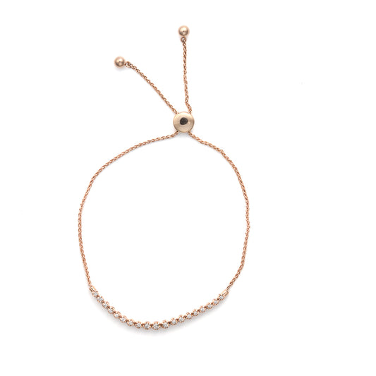 Rose gold bracelet with round diamonds.