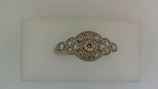 Gold ring with intricate diamond design.