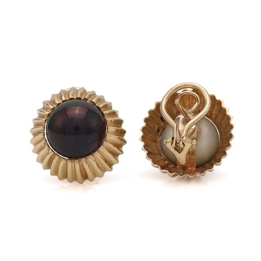 14K gold earrings with black Mabe' pearls.