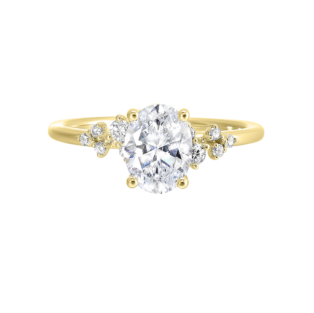 Yellow gold ring with central and side diamonds.