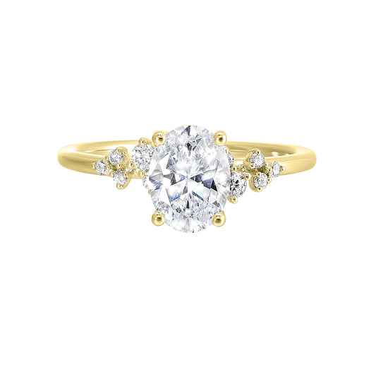 Yellow gold ring with central and side diamonds.