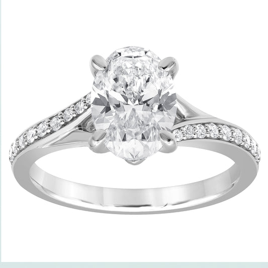 Oval diamond white gold wedding set.