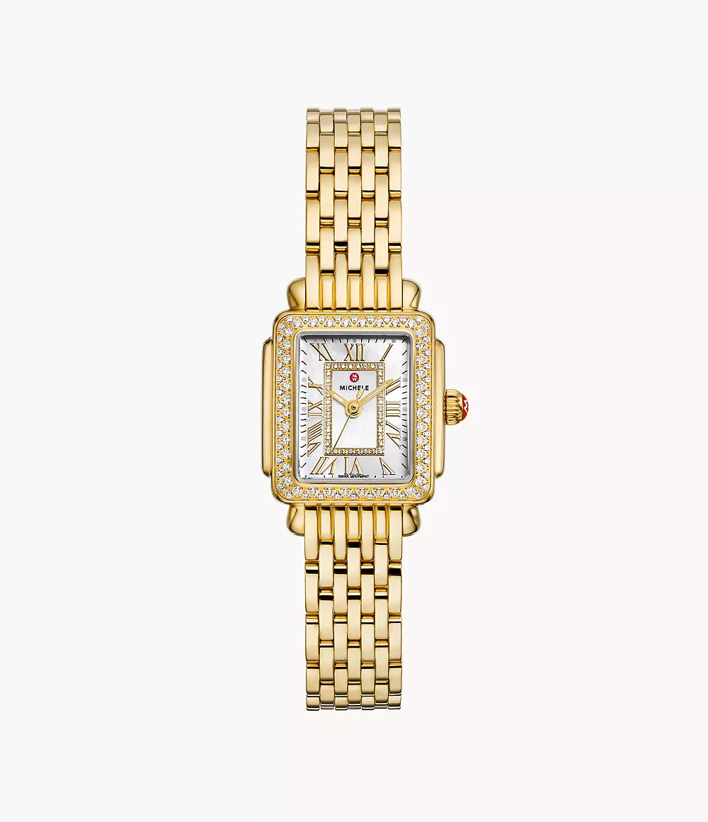 Gold watch with diamond bezel.