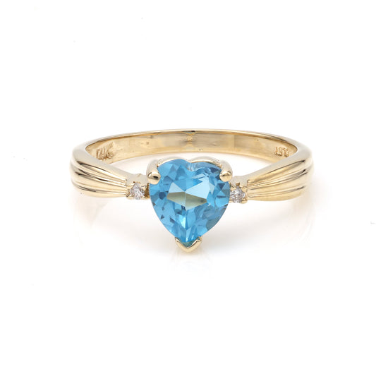 Heart-shaped blue topaz ring in gold.