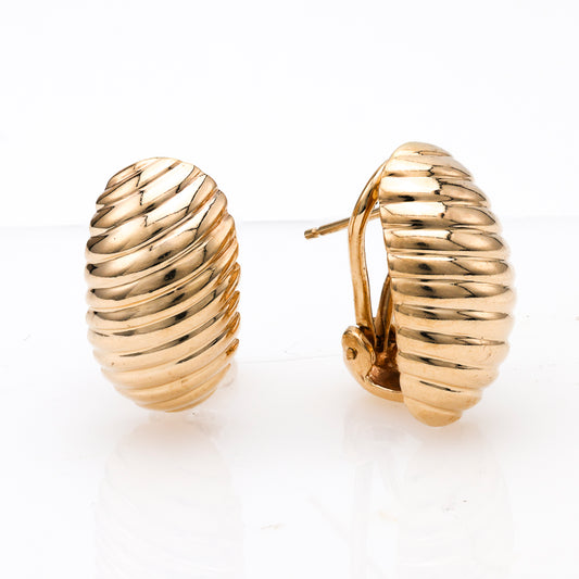 14K yellow gold ribbed huggie earrings.