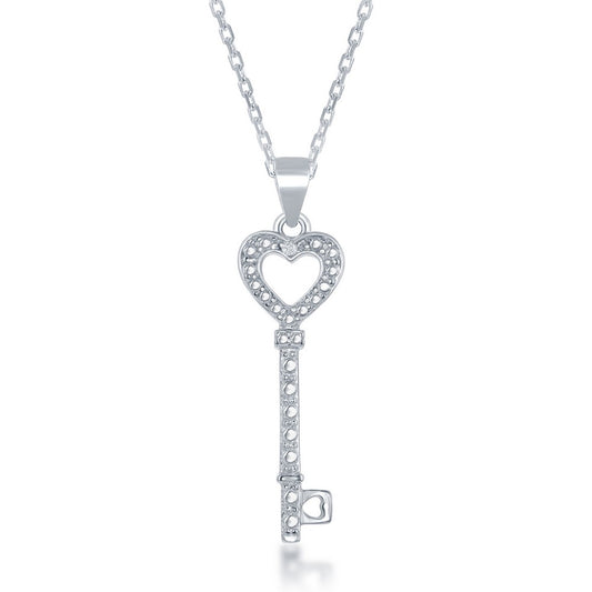 Heart-shaped key pendant with diamond accents.