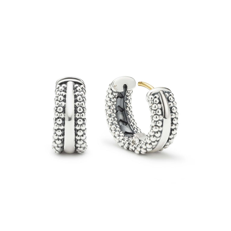 Sterling silver beaded huggie earrings.