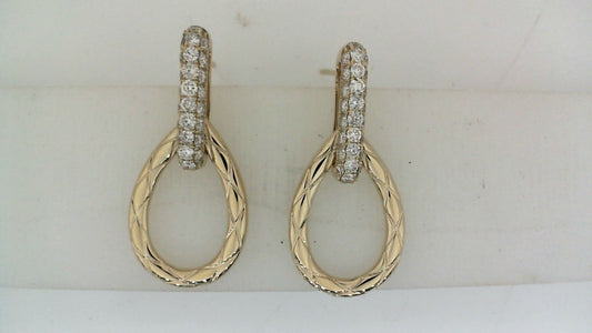 Gold drop earrings with round diamonds.