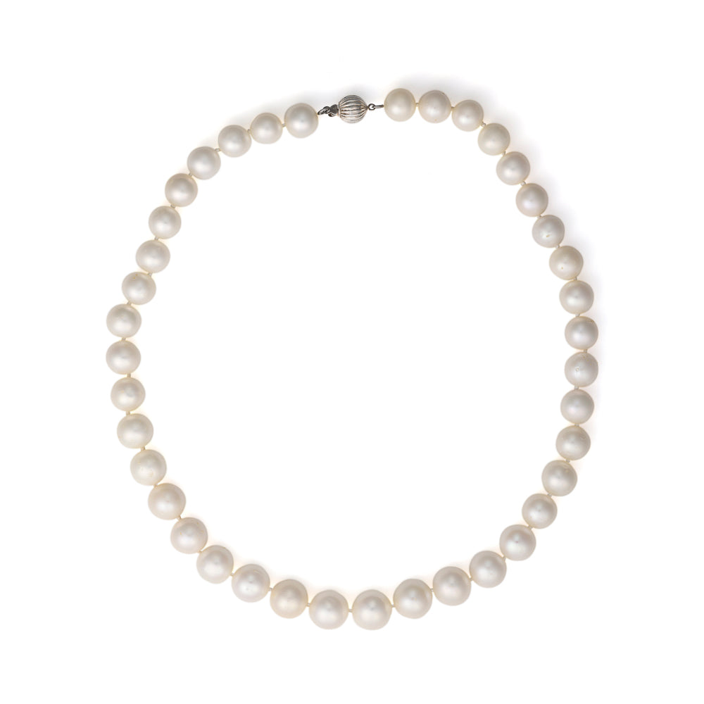 Freshwater pearl necklace with sterling silver clasp.