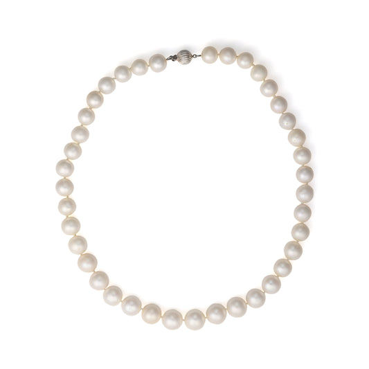 Freshwater pearl necklace with sterling silver clasp.