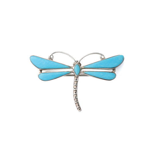 Dragonfly brooch with turquoise stones.