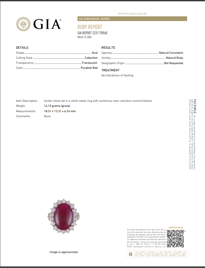 Cabochon ruby ring with diamond accents.