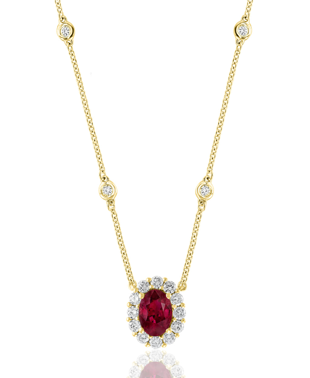 Oval ruby necklace with diamond accents.