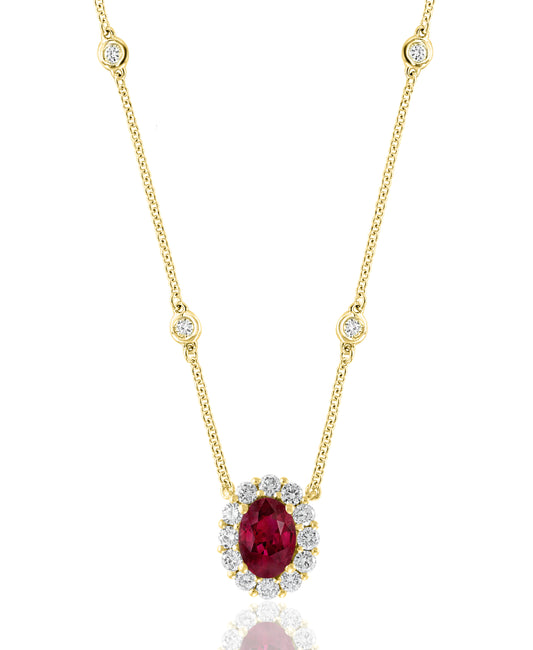 Oval ruby necklace with diamond accents.