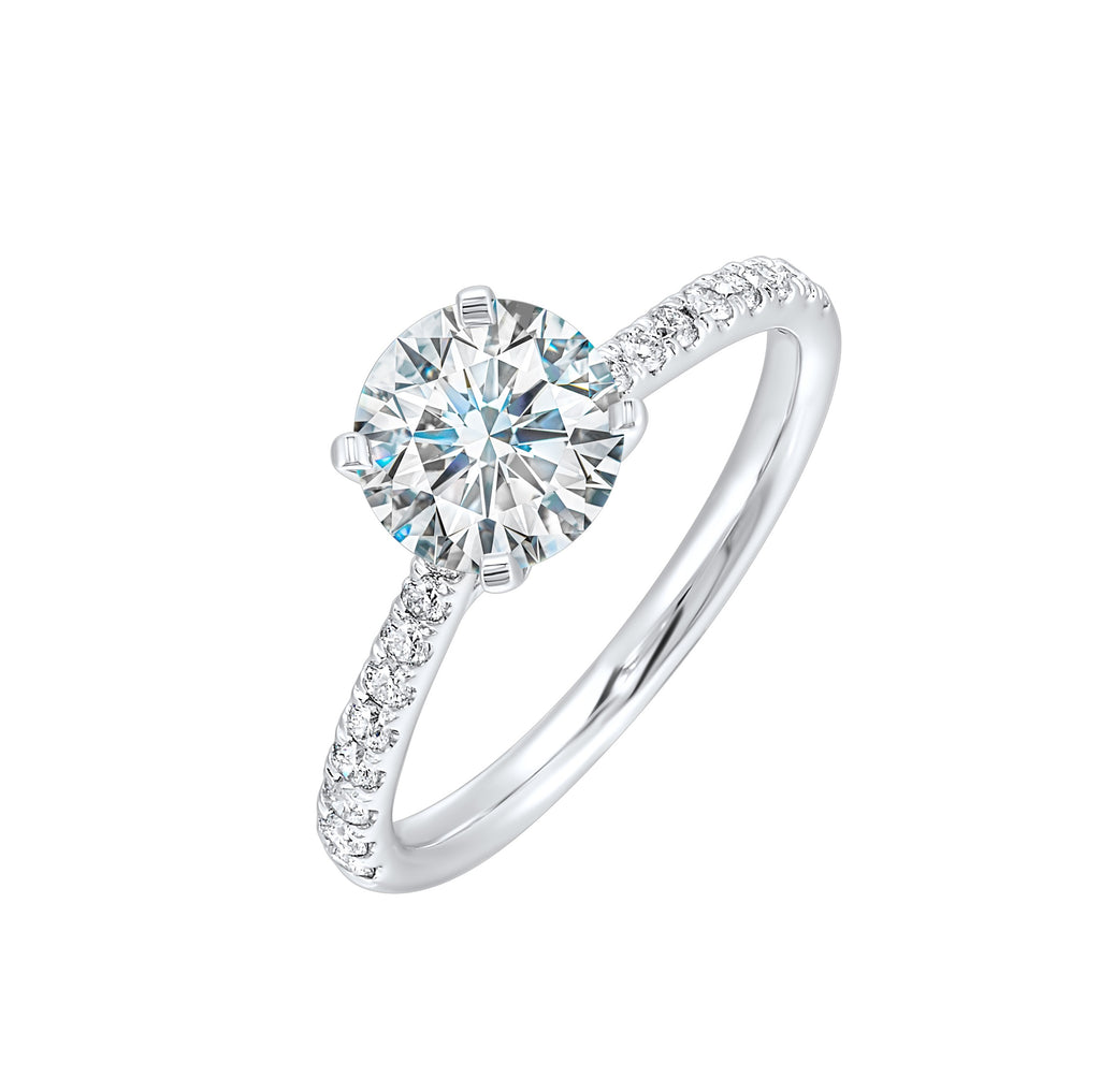 White gold ring with side diamonds.