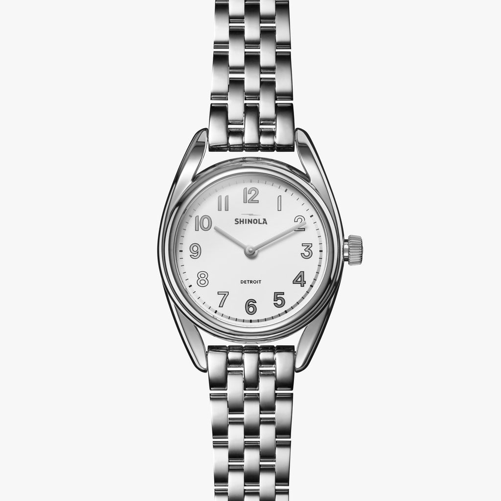 Shinola stainless steel watch with white dial.