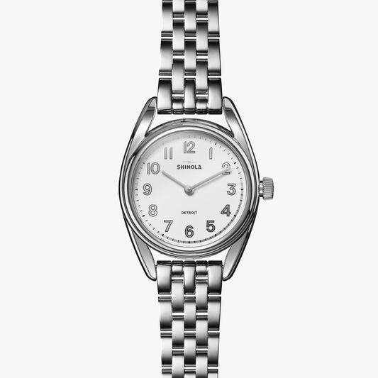 Shinola stainless steel watch with white dial.