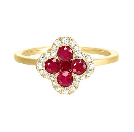 Ruby and diamond cluster ring in gold.
