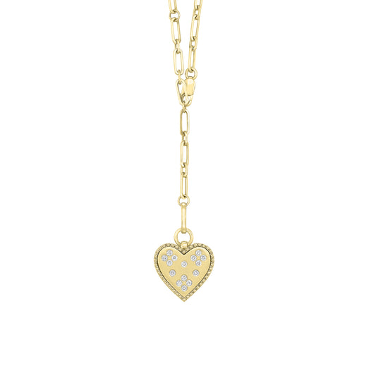 Heart-shaped diamond pendant, yellow gold chain.
