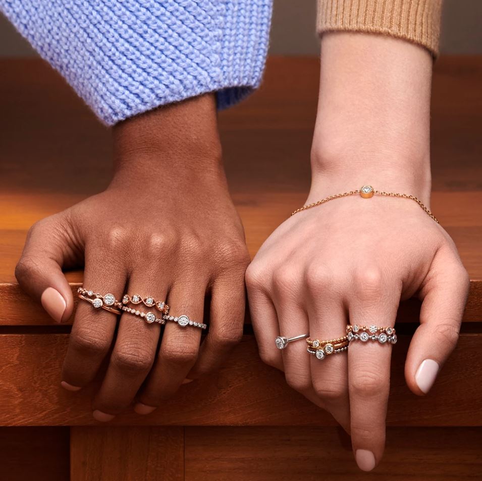 Rose gold ring with round diamonds.