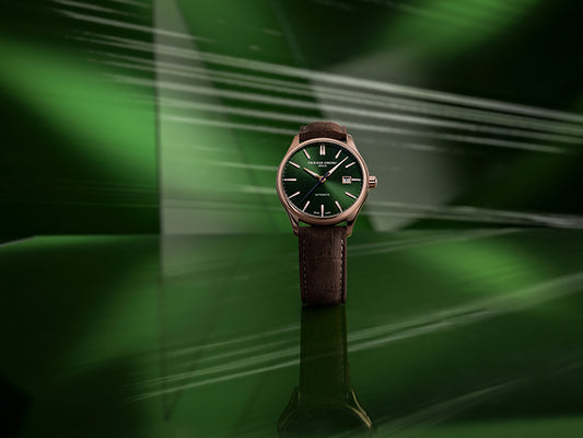 Green-dial watch with leather band.