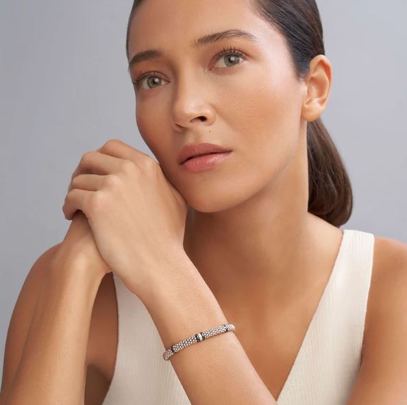 Sterling silver bracelet with round diamonds.