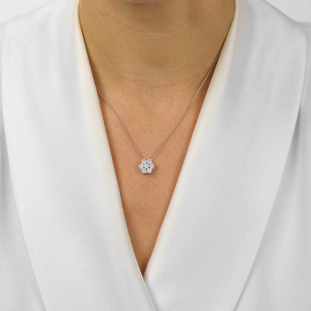 14K white gold necklace with round diamonds.