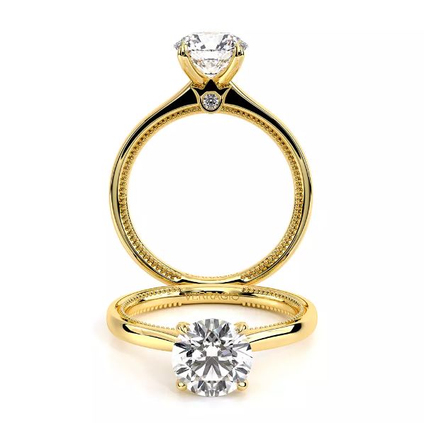VERRAGIO gold ring with round diamond.