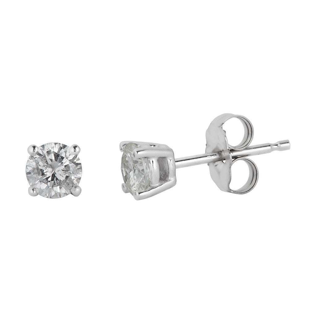 Round diamond studs in white gold.