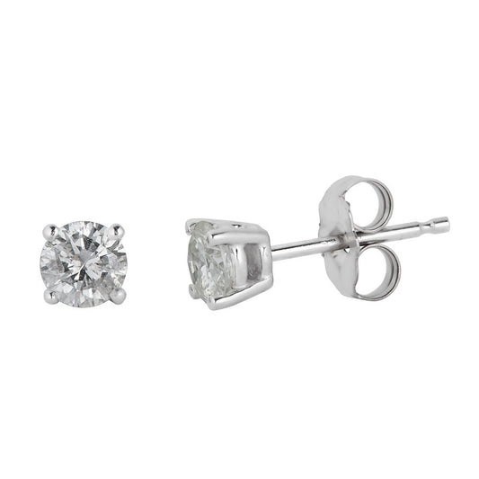 Round diamond studs in white gold.