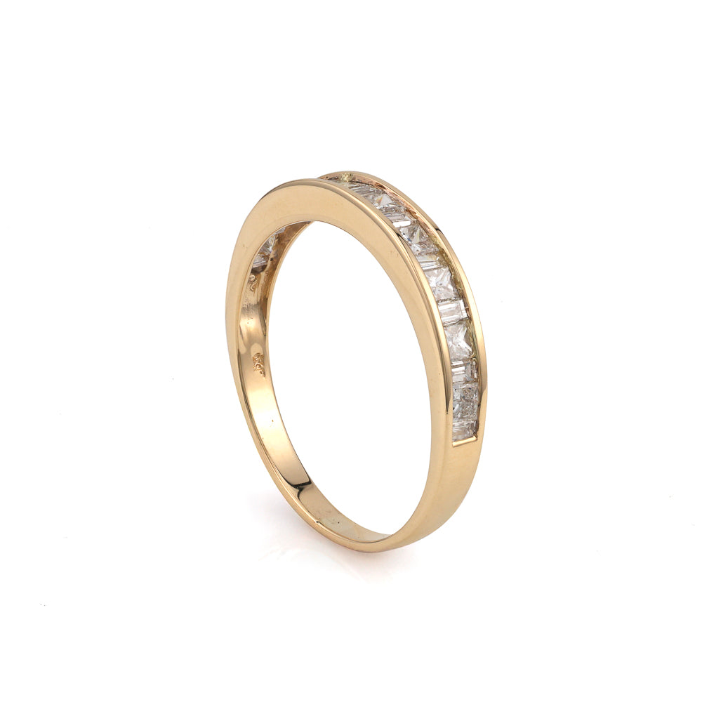 Yellow gold band with baguette diamonds.