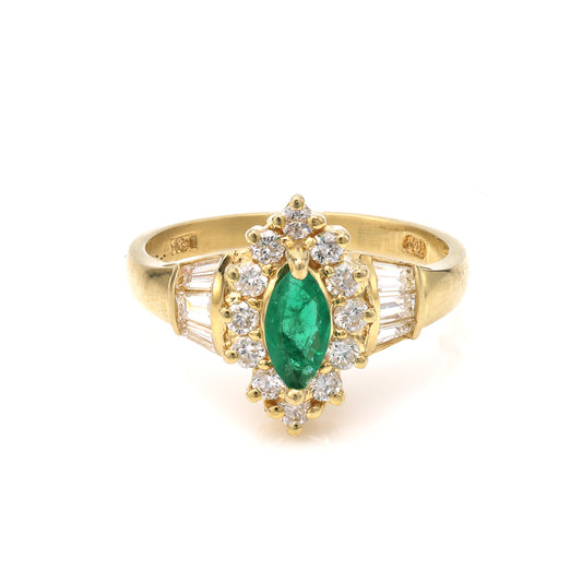 Marquise emerald ring with diamonds.