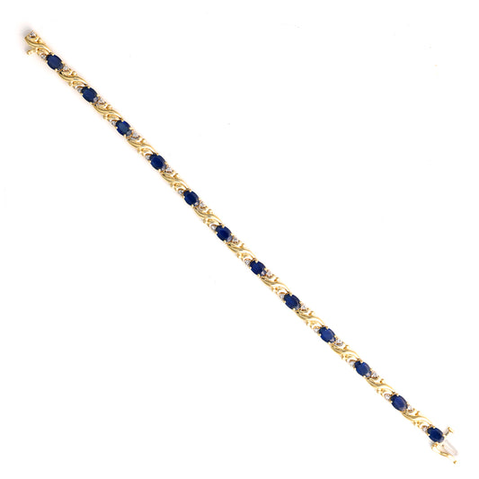 Blue sapphire bracelet in yellow gold.