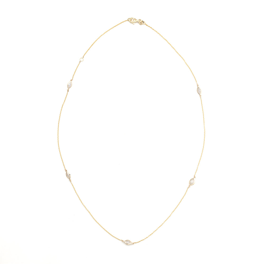 14K yellow gold necklace with marquise diamonds.