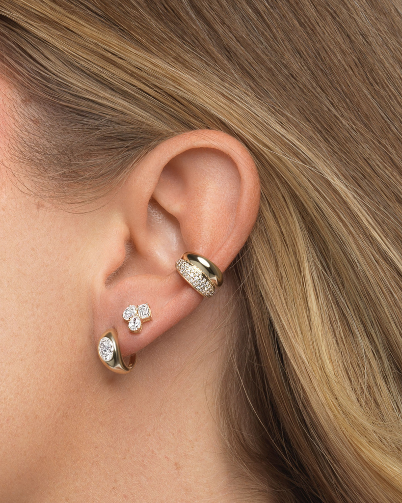 Stud earrings with various shaped diamonds.